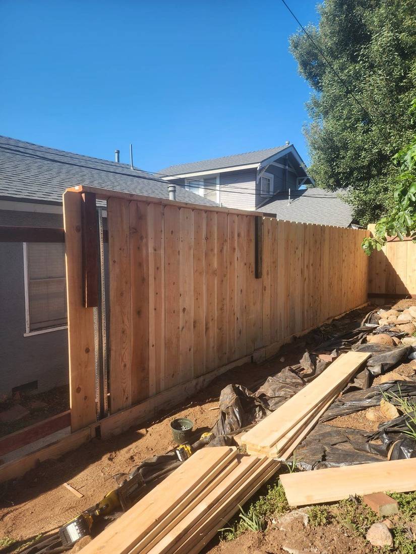New cedar fence installed behind a San Diego home — Benitez Tree Service